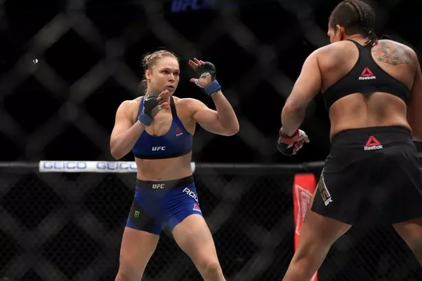 daisy tong recommends ronda rousey boob slip pic