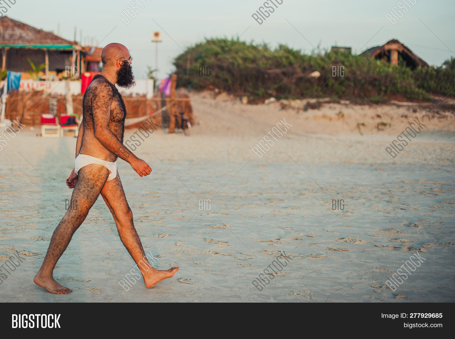 abid ali roopani add photo hairy man on beach