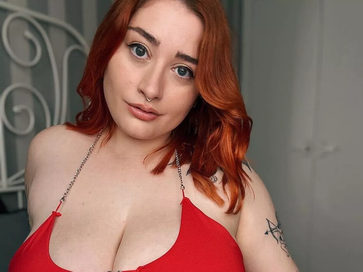 Redhead With Huge Tits sleeve porn