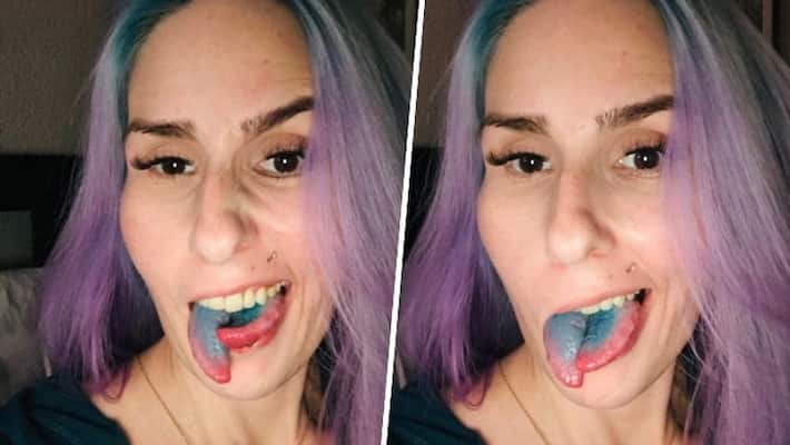 andrew charvat add woman with split tongue photo