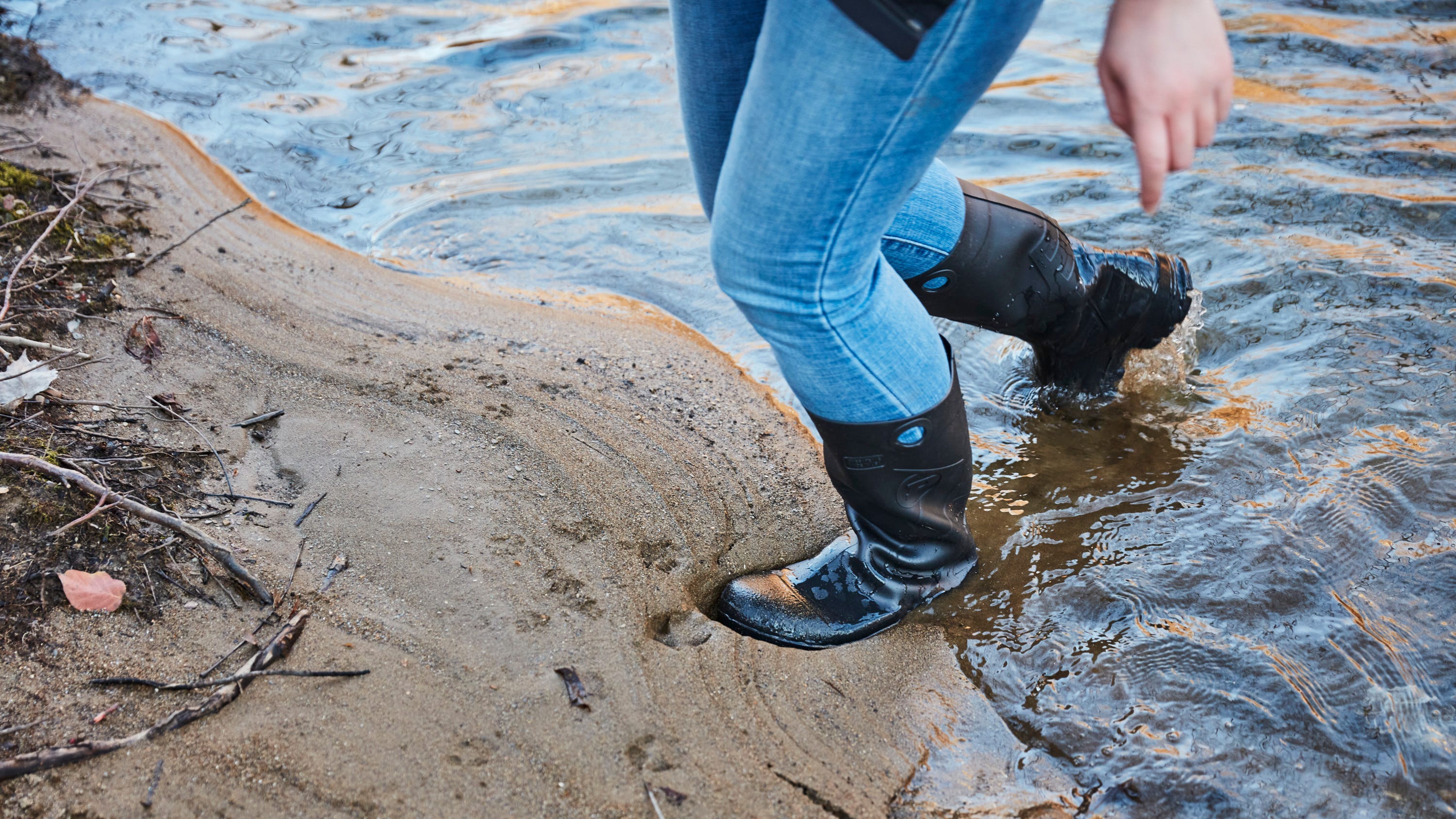 thigh high boots in mud