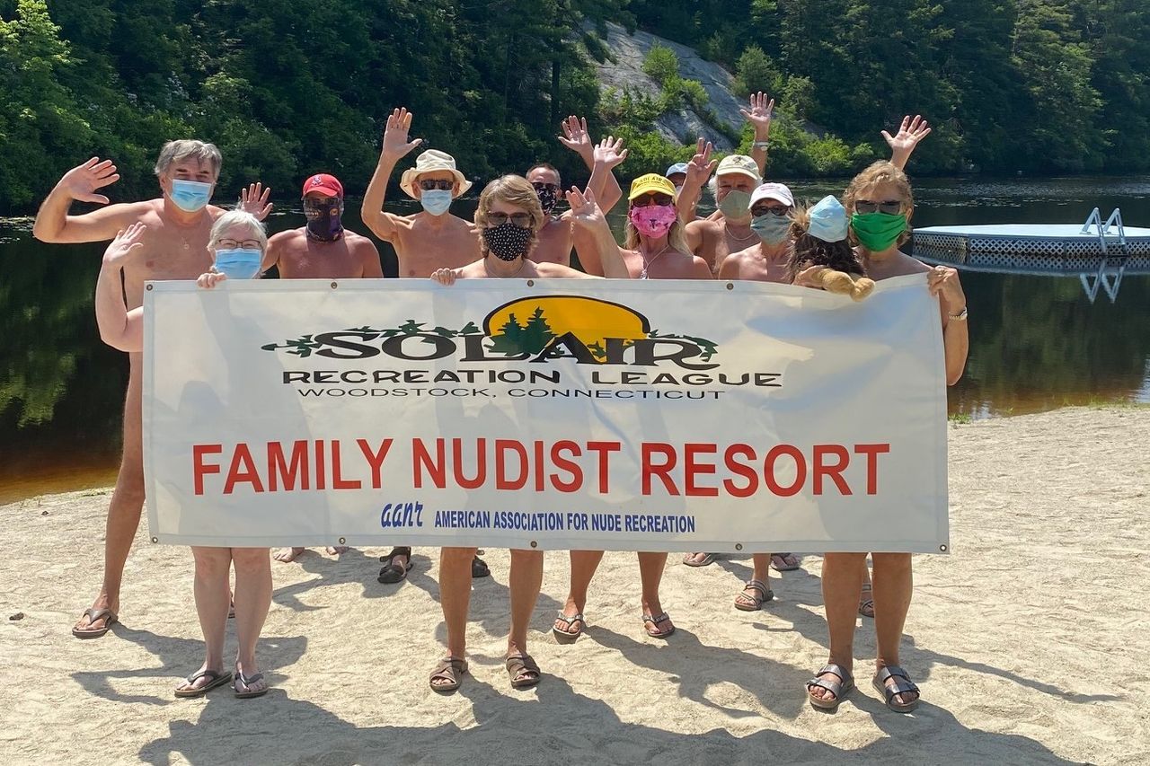 devi manohar add naturist family at beach photo