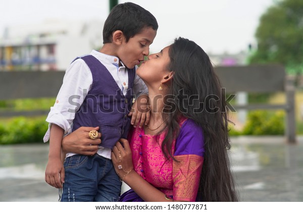 brother and sister kissing photos