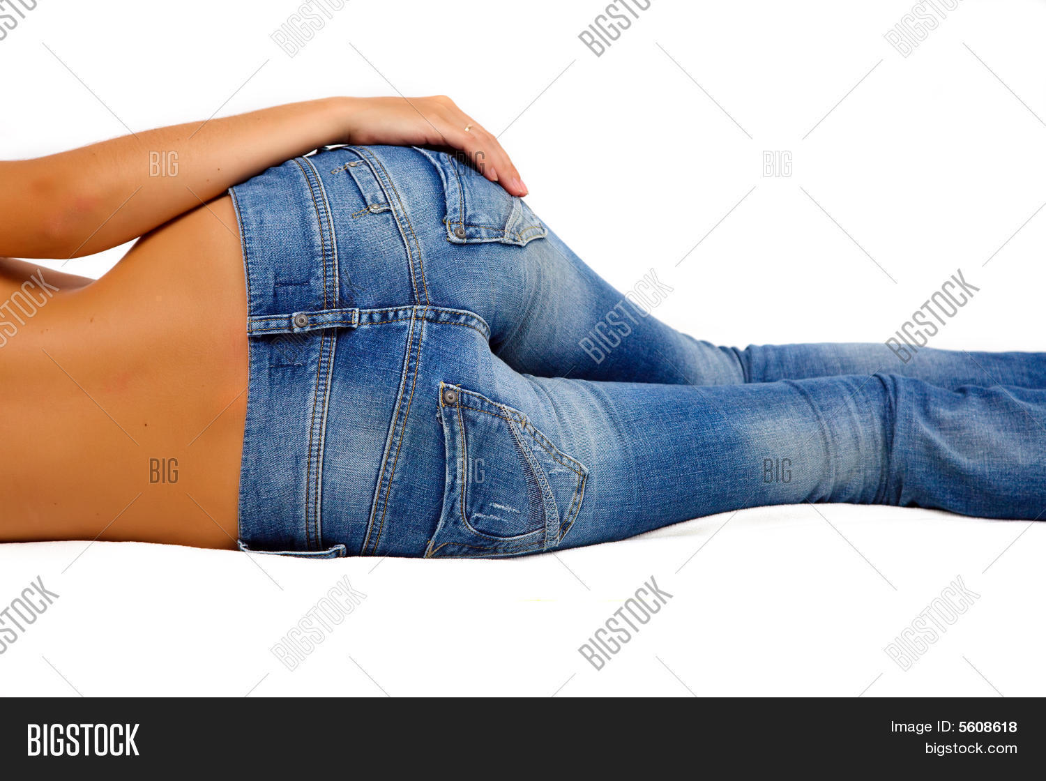 topless women in blue jeans