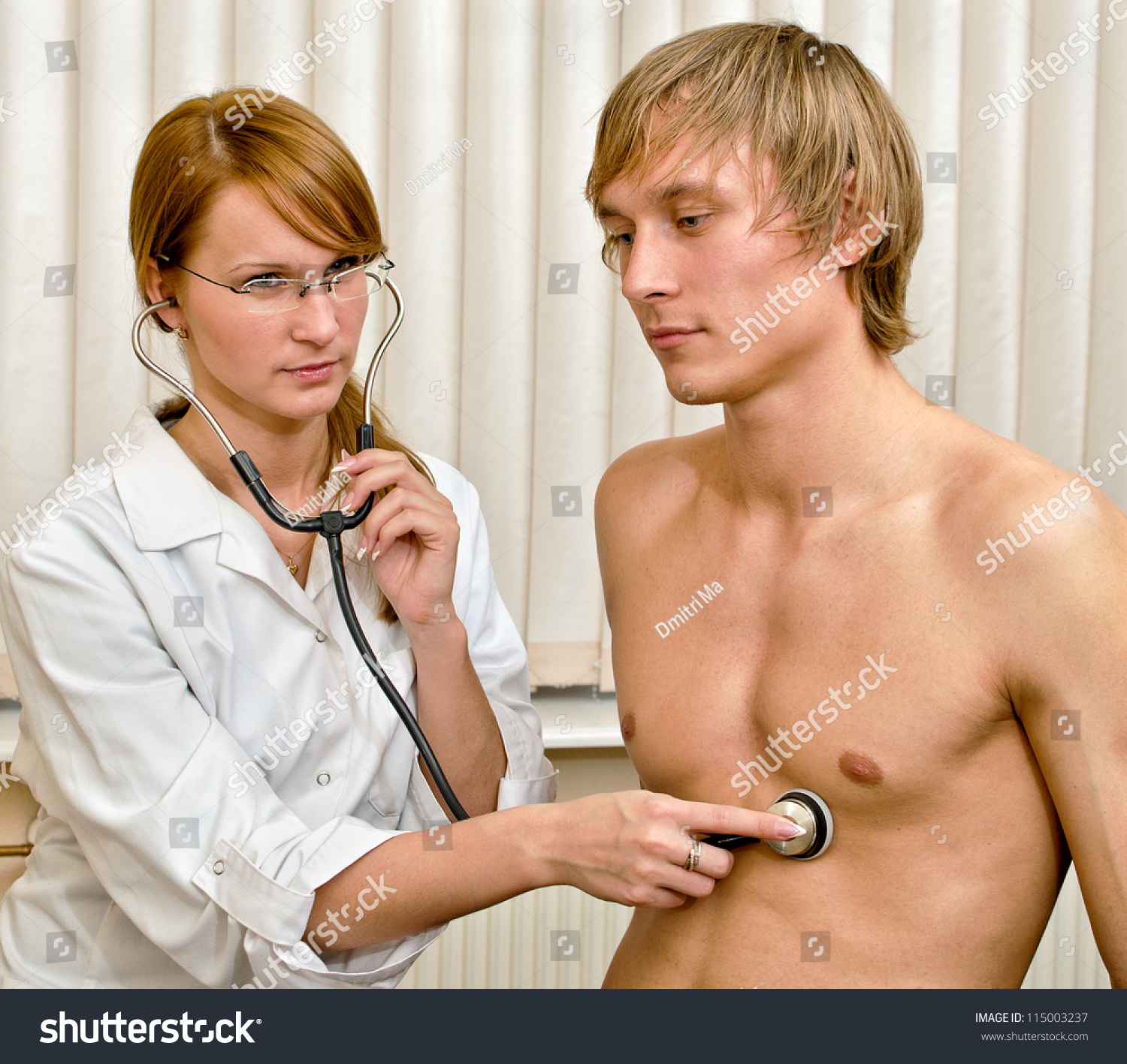 female doctor checking male