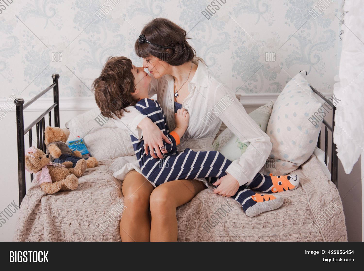 claude rahme add mom and boy in bed photo