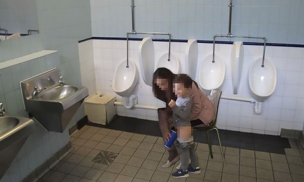 avdi gashi add mom helps son pee photo