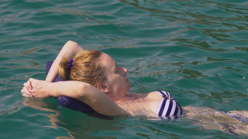 becky eaves add tits floating in water photo