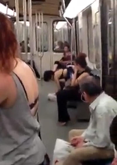 barbara glowacka add man eating woman on subway photo