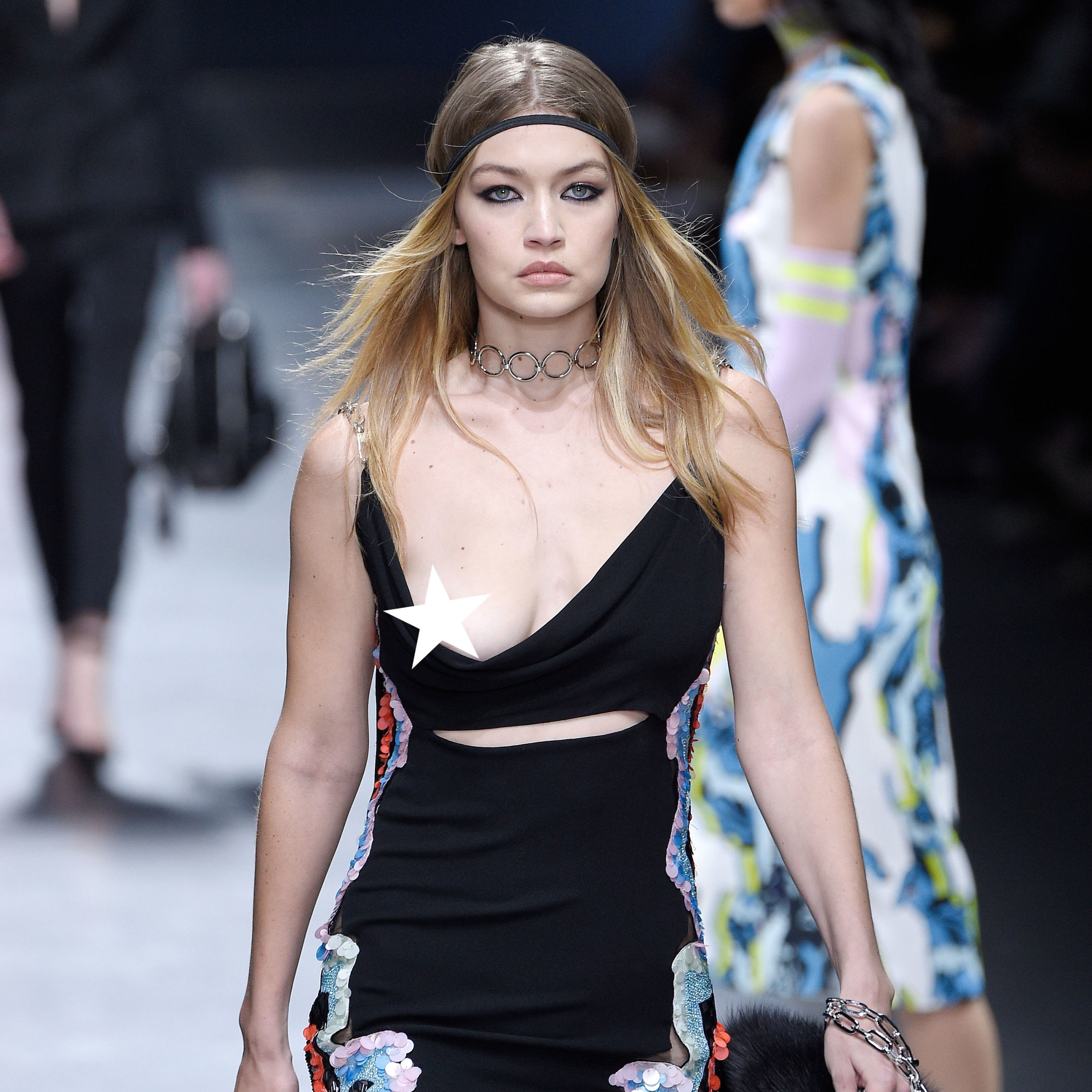 denis cuison recommends gigi hadid nip slip versace pic