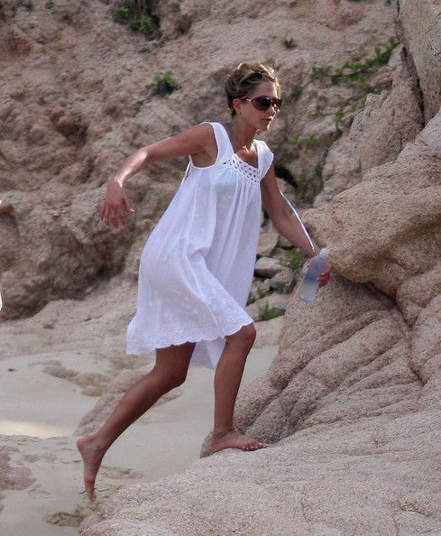 cecile canlas recommends jennifer aniston beach walk pic