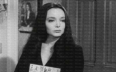 curt brownlee recommends morticia addams gif pic