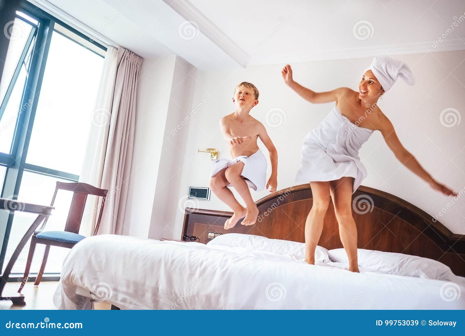 mother and son share bed