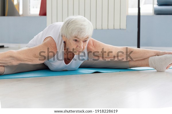 anshul suri add old lady doing splits photo