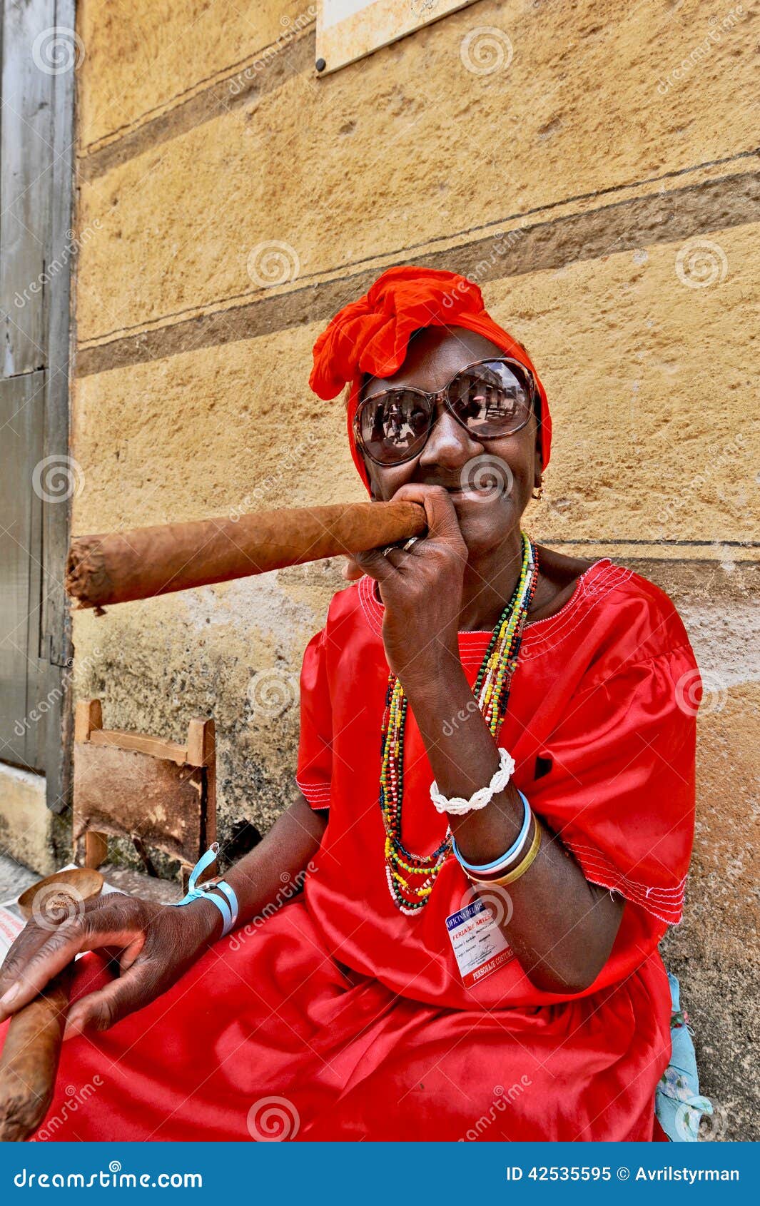 amar bhowmik add old lady smoking cigar photo