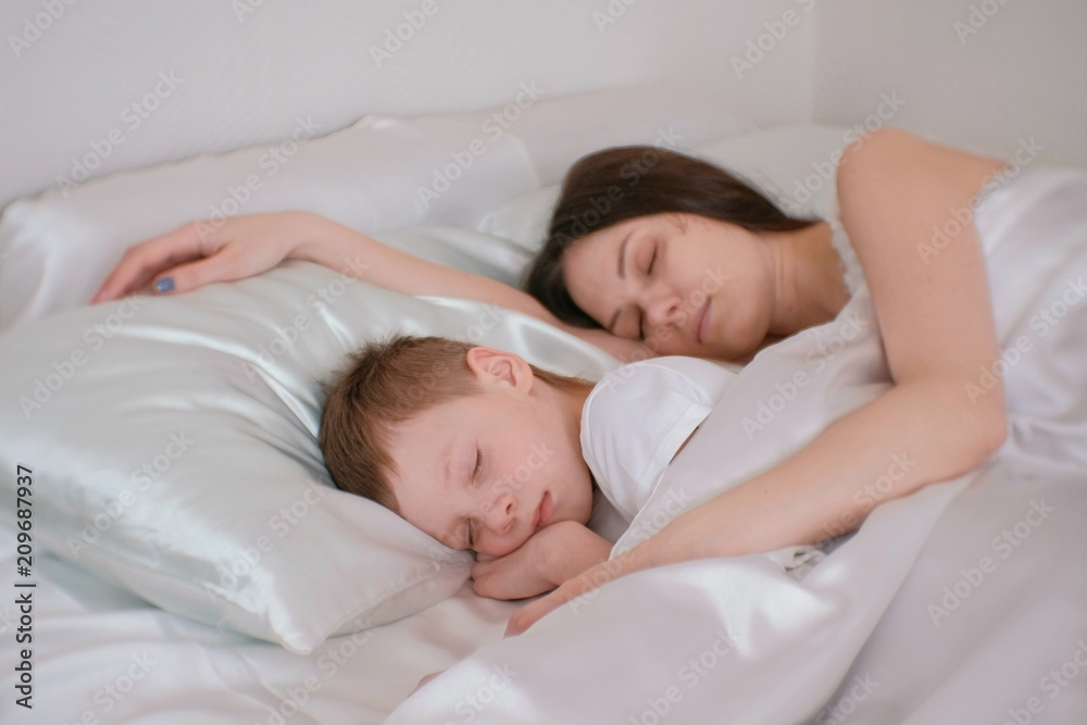 sleeping mom and son
