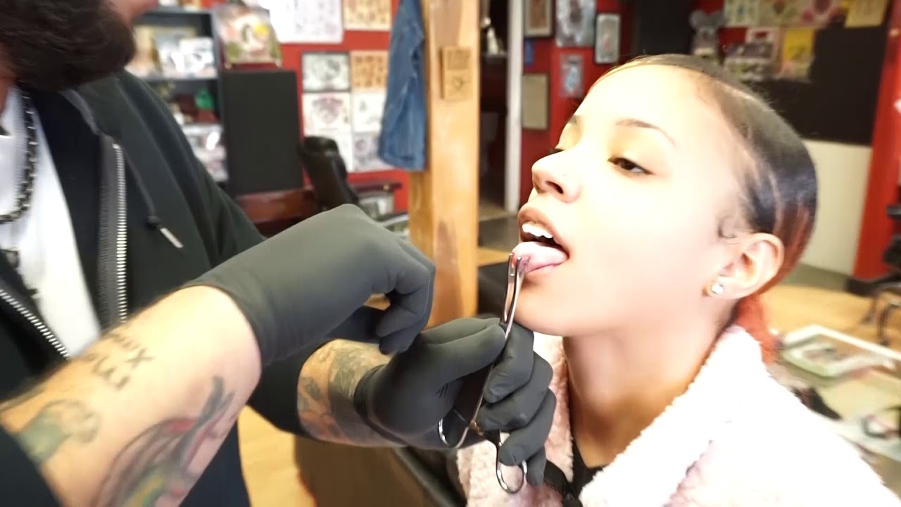 deb nuttall add video of tongue piercing photo