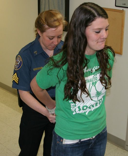 Woman Handcuffed Behind Back 14 air